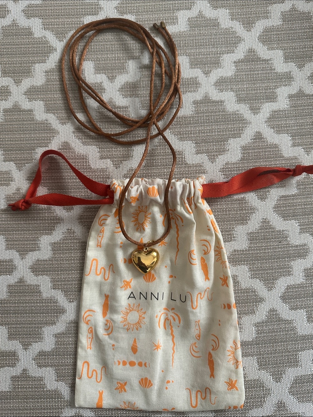 Anni Lu Gold Heart Pendant Necklace on Brown Cord